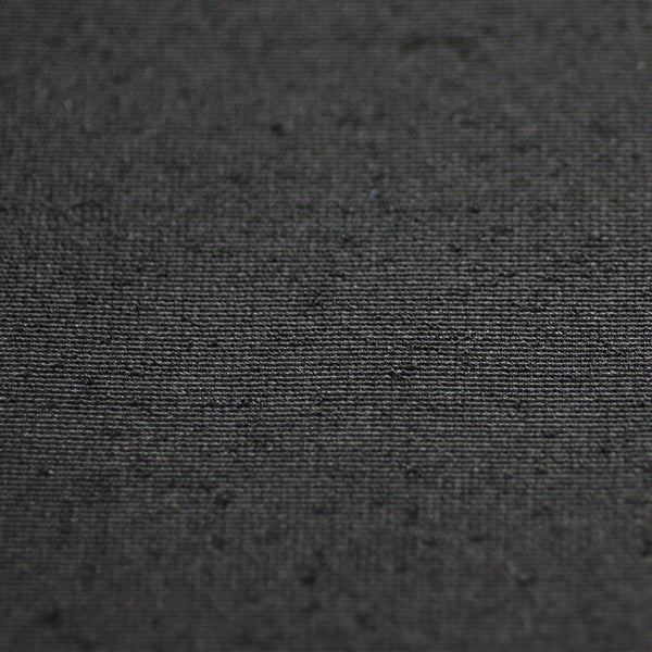 Close-up of the black fabric.
