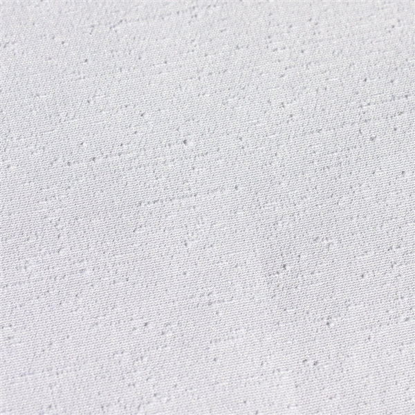 Close-up of the white version of the tsumugi polyester fabric.