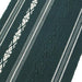 Close-up of the green obi details.