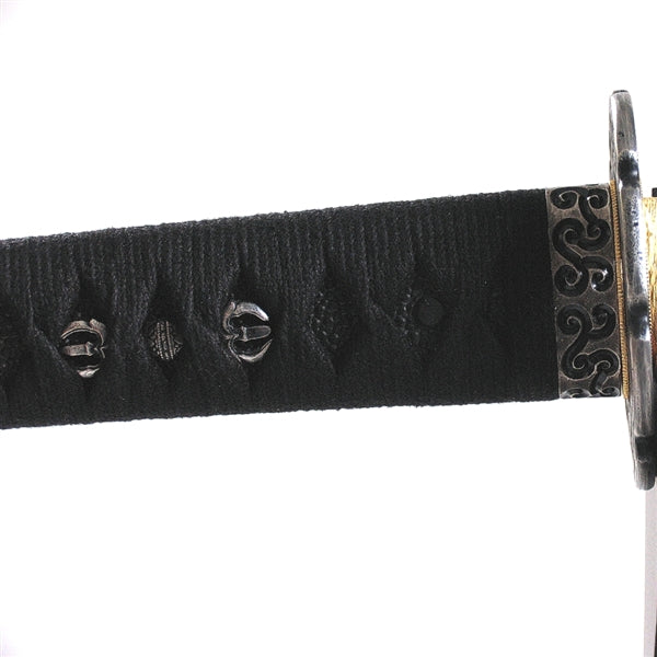 Close-up of the kongosho themed menuki underneath hinerimaki black cotton wrapping.