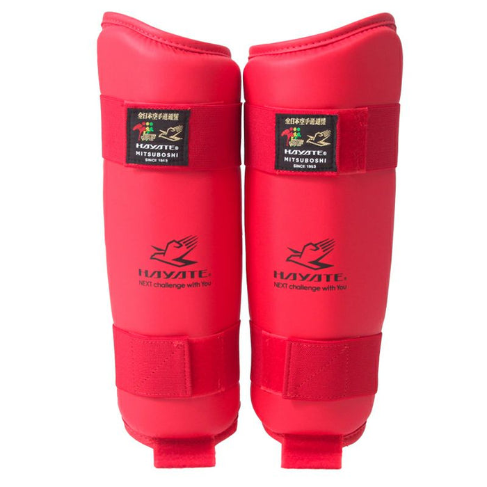 Red shin guards with Hayate branding on a white background
