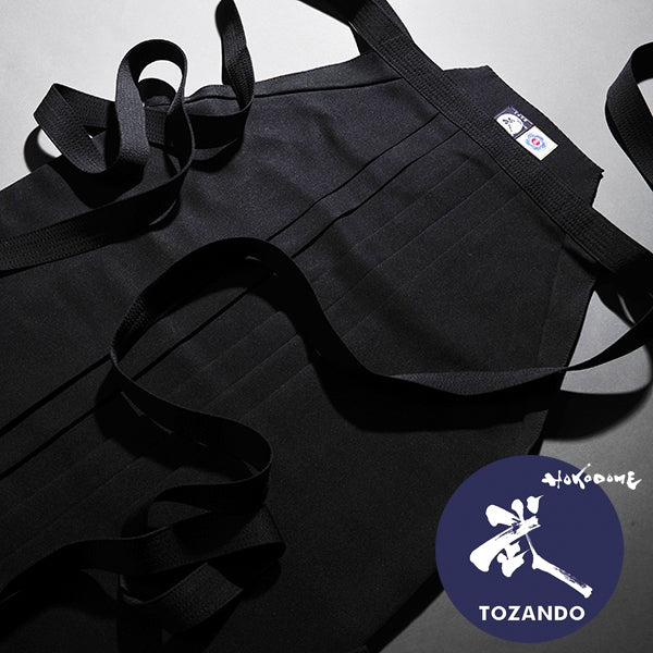 Close-up of some tailored aikido hakama.