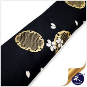 Close-up of the luxurious yukiwa and sakura silk brocade design.