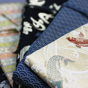 A selection of brocade fabrics seen next to each other.