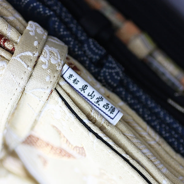 Close-up of the edge stitching and Heian Tailors label.