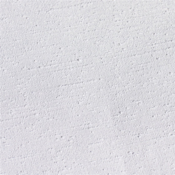 Close-up of the white version of the tsumugi polyester fabric.