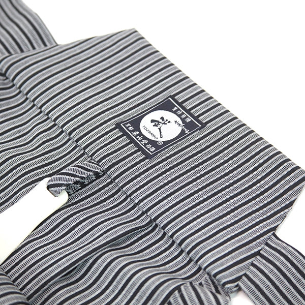 Close-up of the hand-stitched koshi-ita part of the hakama.