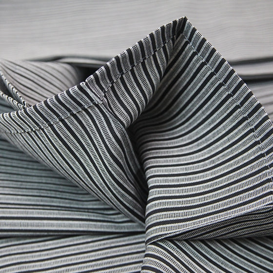 Close-up of the stitching at the lower hem.