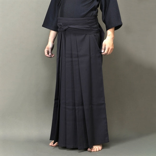 A pair of tailored kendo hakama worn.
