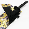 The hanawa brocade bag with an iaito inside it showing the inner lining.