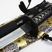 The hanawa brocade bag with an iaito and saya top.