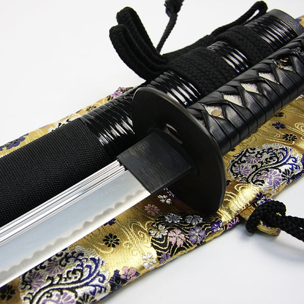The hanawa brocade bag with an iaito and saya top.