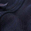 Fabric and sashiko-weave clsoe-up.