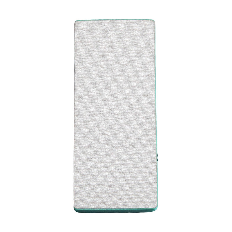 The smooth finishing surface of the block.
