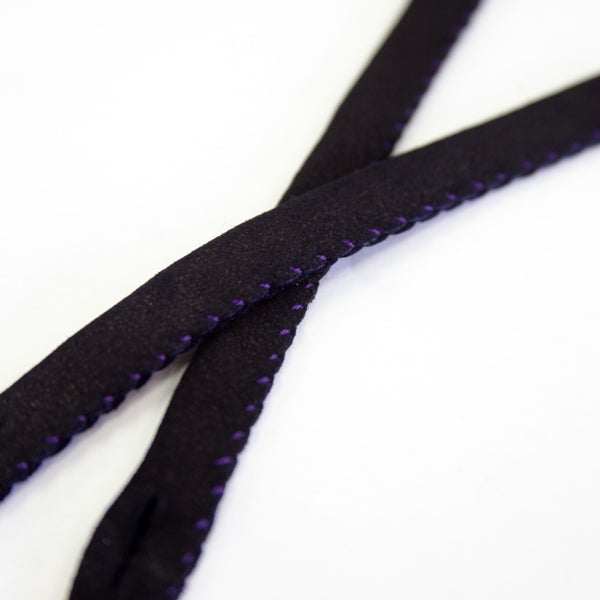 Close-up of the sewn fabric of the deerskin chichikawa.