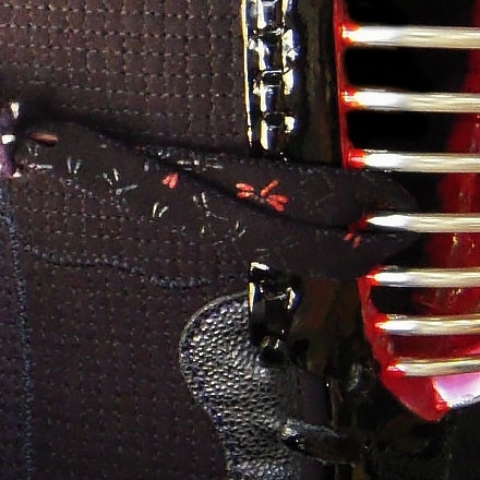 Close-up view of the tombo version in use on a kendo men.