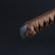 Close-up of the finely wrought karakusa kashira.