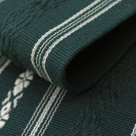 Close-up of the green kaku obi hem.