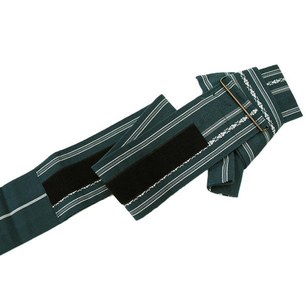 The green obi unfolded.