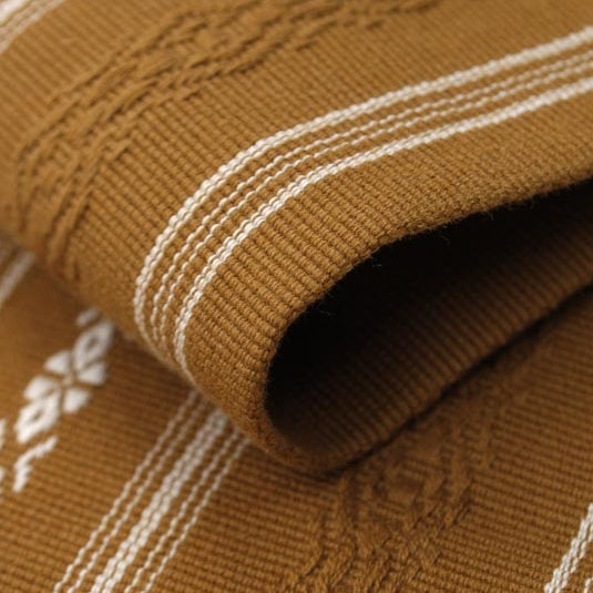 Close-up of the hem work on the mustard obi.
