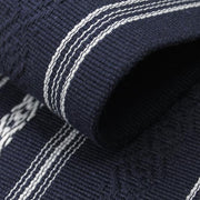 The hem line on the navy kaku obi.