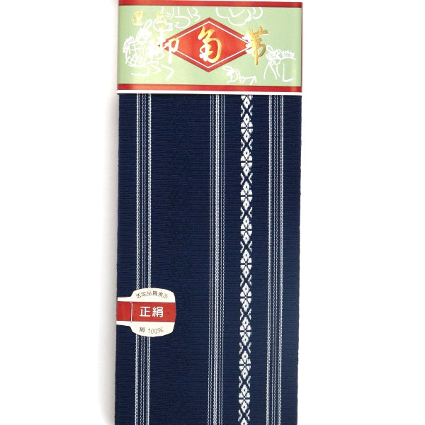 The navy kaku obi in its packaging.