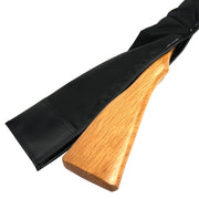 The opening at the end of the bag showing the butt of the mokuju.
