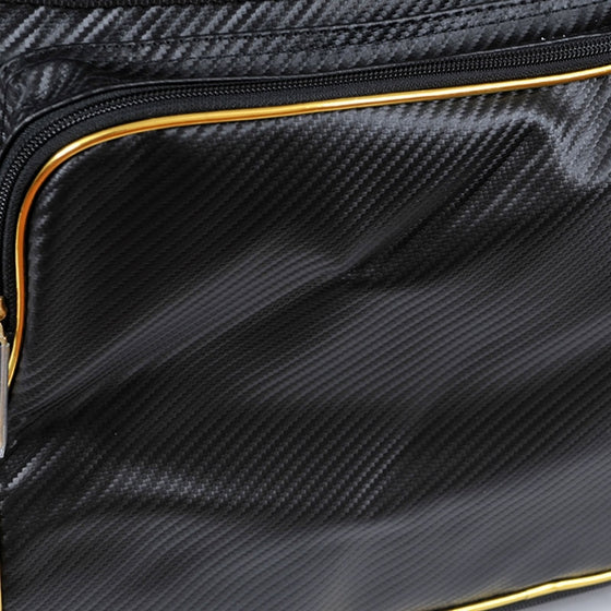 Close-up of the techno leather and gold trim.
