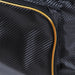 Close-up of the front pocket zip and gold trim.