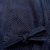 Chest himo and fabric close-up.