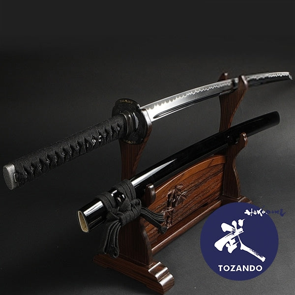 Full view of the iaito on a rack and out of its saya.
