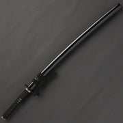 The iaito inside a kuroro gloss black saya