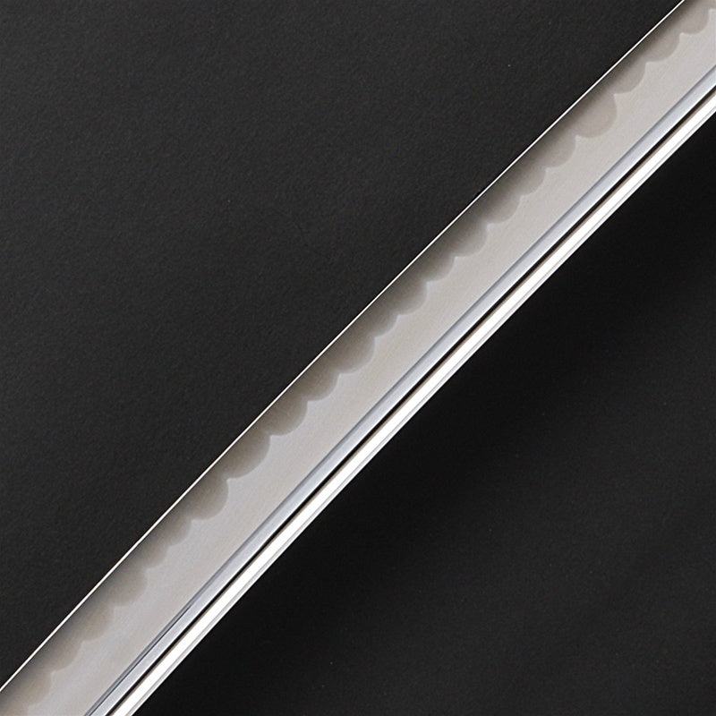 Close-up of the toshin feautring a gunome hamon.