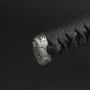 Close-up of the satsuma style nami chidori kashira fitting.