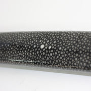 Close-up view of the laquered sosame saya.