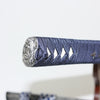 Close-up of the hiranami kashira and silk navy ito.