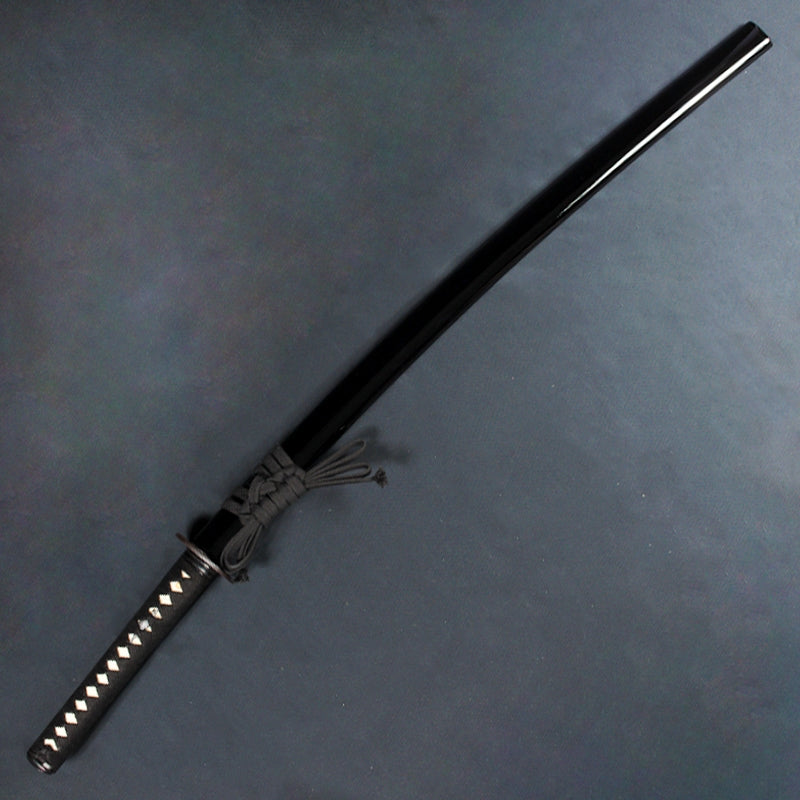 The tachi inside its saya.