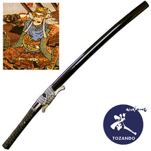  Full view of the iaito with the saya and the picture of Maeda Kaiji