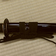 The gloss black kuroro saya option with black cotton sageo.