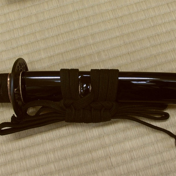 The gloss black kuroro saya option with black cotton sageo.