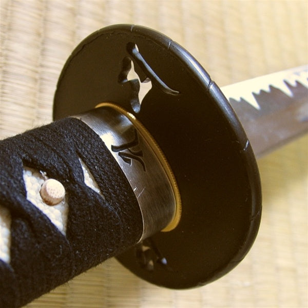 View from the ura side of the bonji themed fuchi and tsuba.