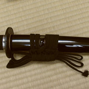 View of the kuroro saya and black cotton sageo.