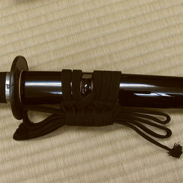 View of the kuroro saya and black cotton sageo.