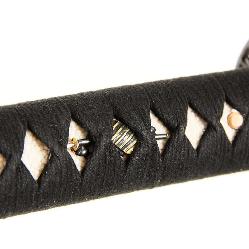 Close-up of the sode and naginata themed menuki.