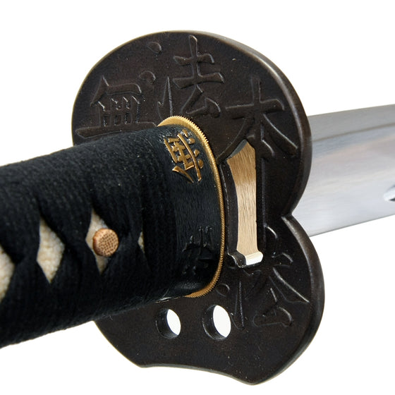 Full view of the fuchi and tsuba from the ura side.