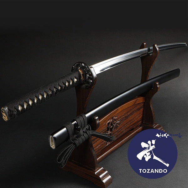 Full view of the iaito on a rack and outside the saya.