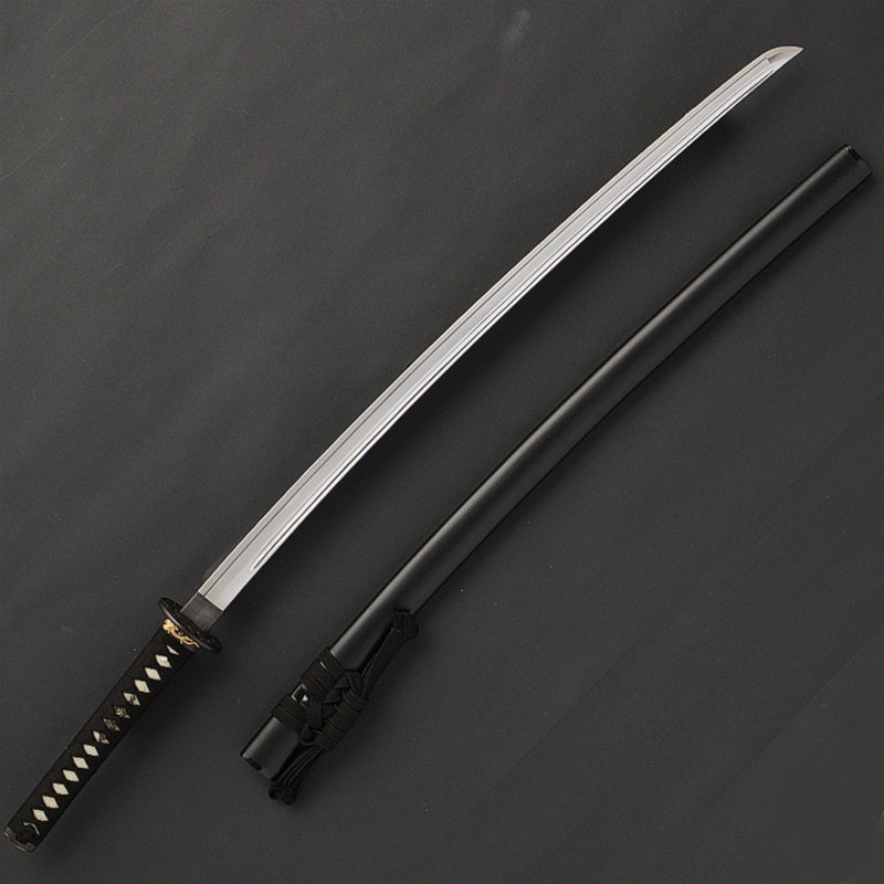 The iaito next to its saya.
