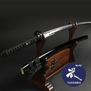 Full view of the iaito on a rack outside of the saya.