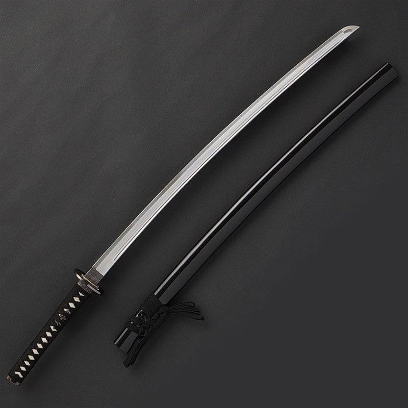 Full view of the iaito next to its saya.