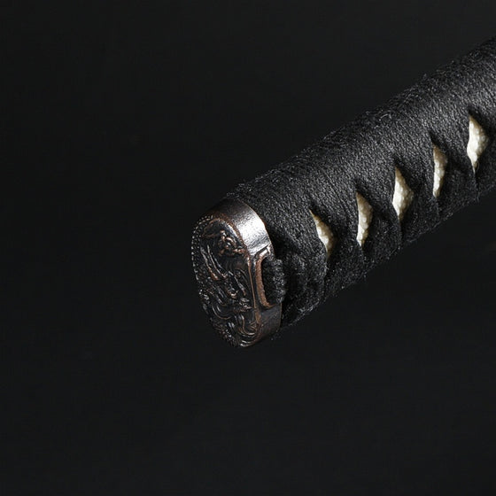 Close up of the kashira fittings on the tsuka.